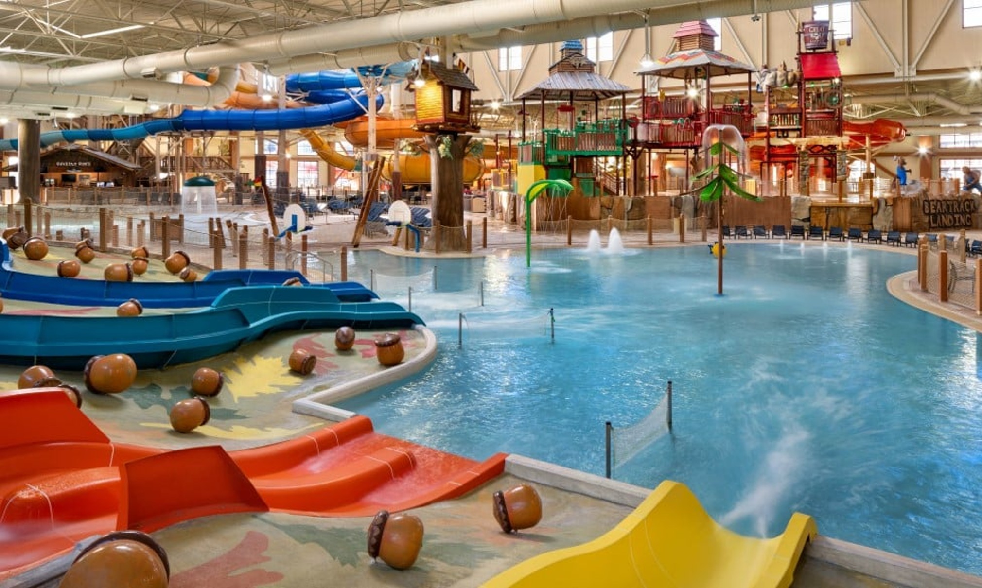 kid rides down waterslide