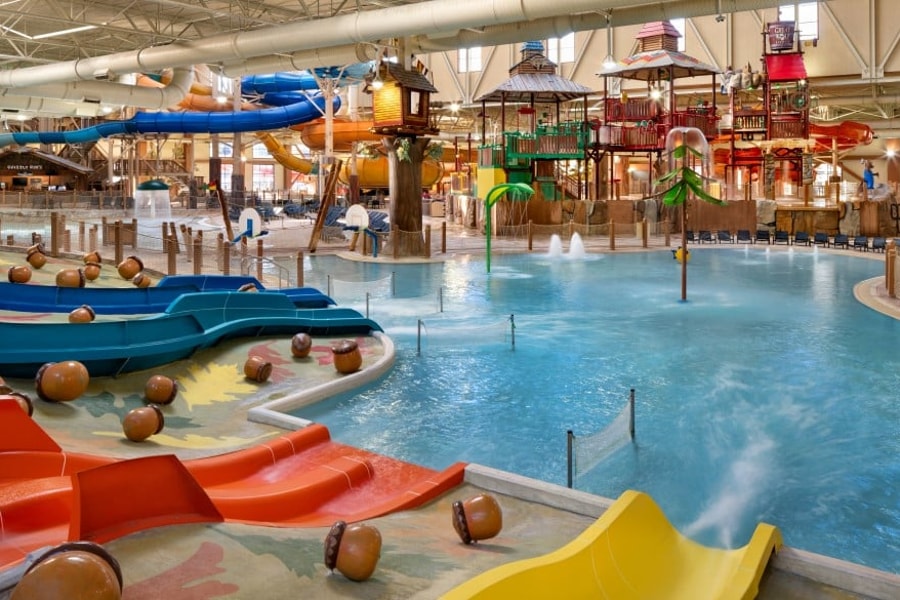 kid rides down waterslide